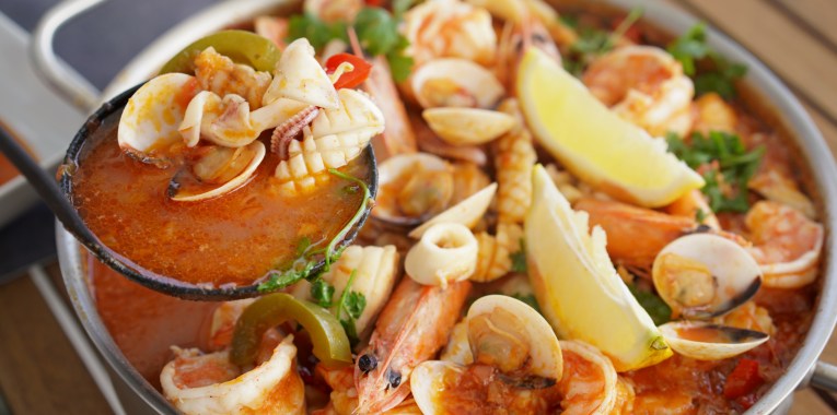 Caldeirada de Peixe brings together the catch of the day, fresh seasonal vegetables, and aromatic spices, simmered in a rich broth.